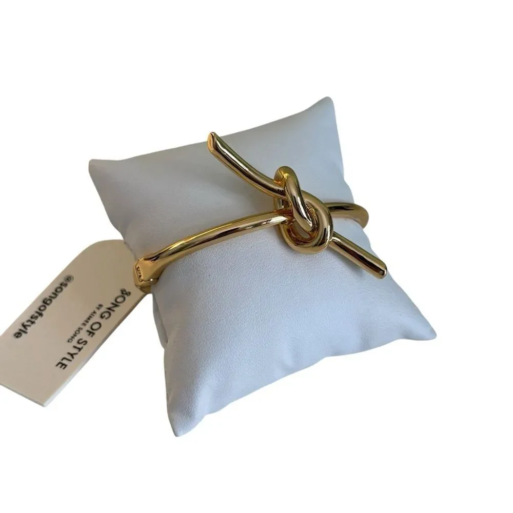 Song of Style Gold Tone Knot Cuff Bracelet.